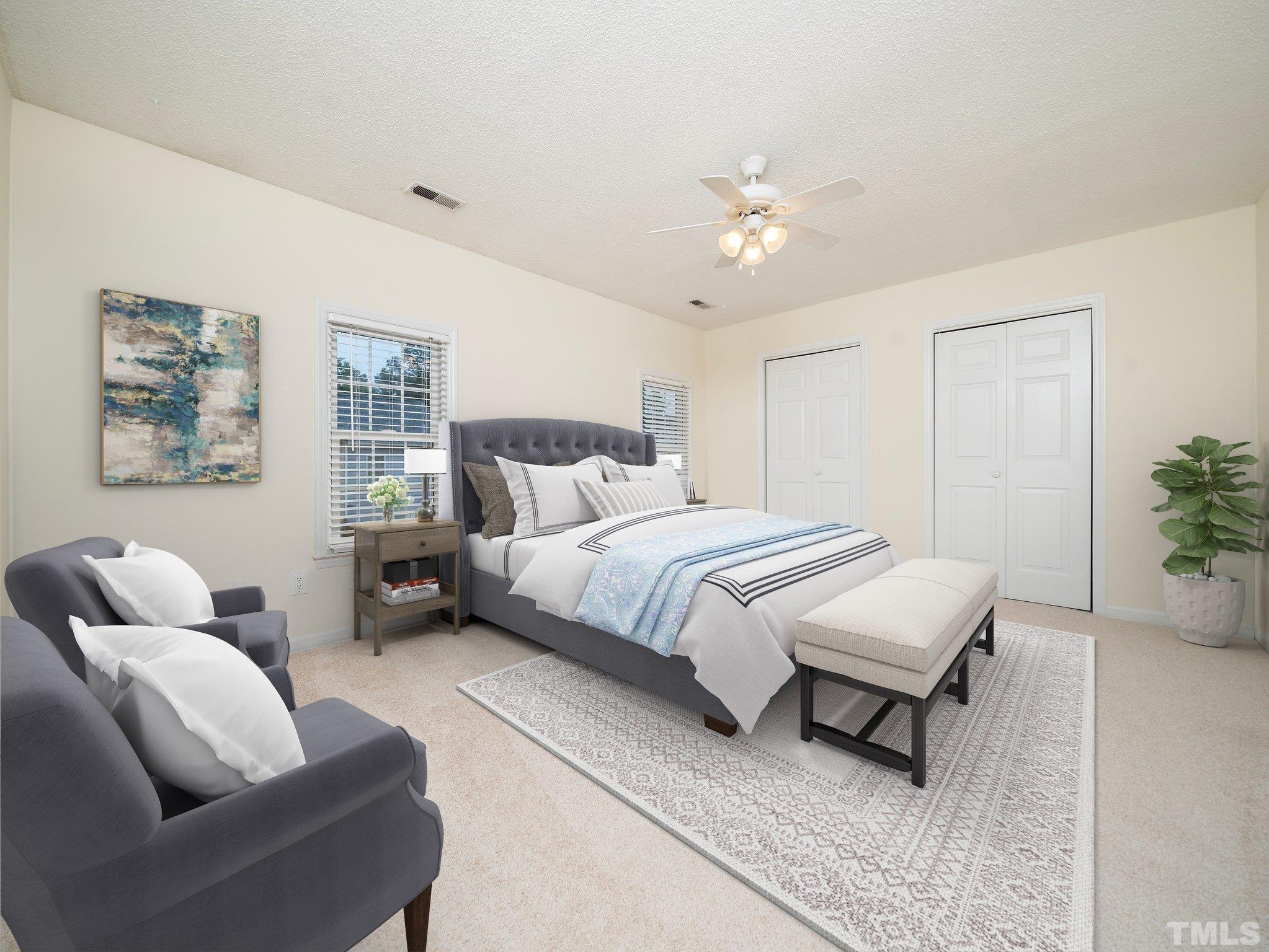 5632 Bridgetowne Way Raleigh, NC 27609 - Photo 13 of 26 a bedroom with furniture and a couch