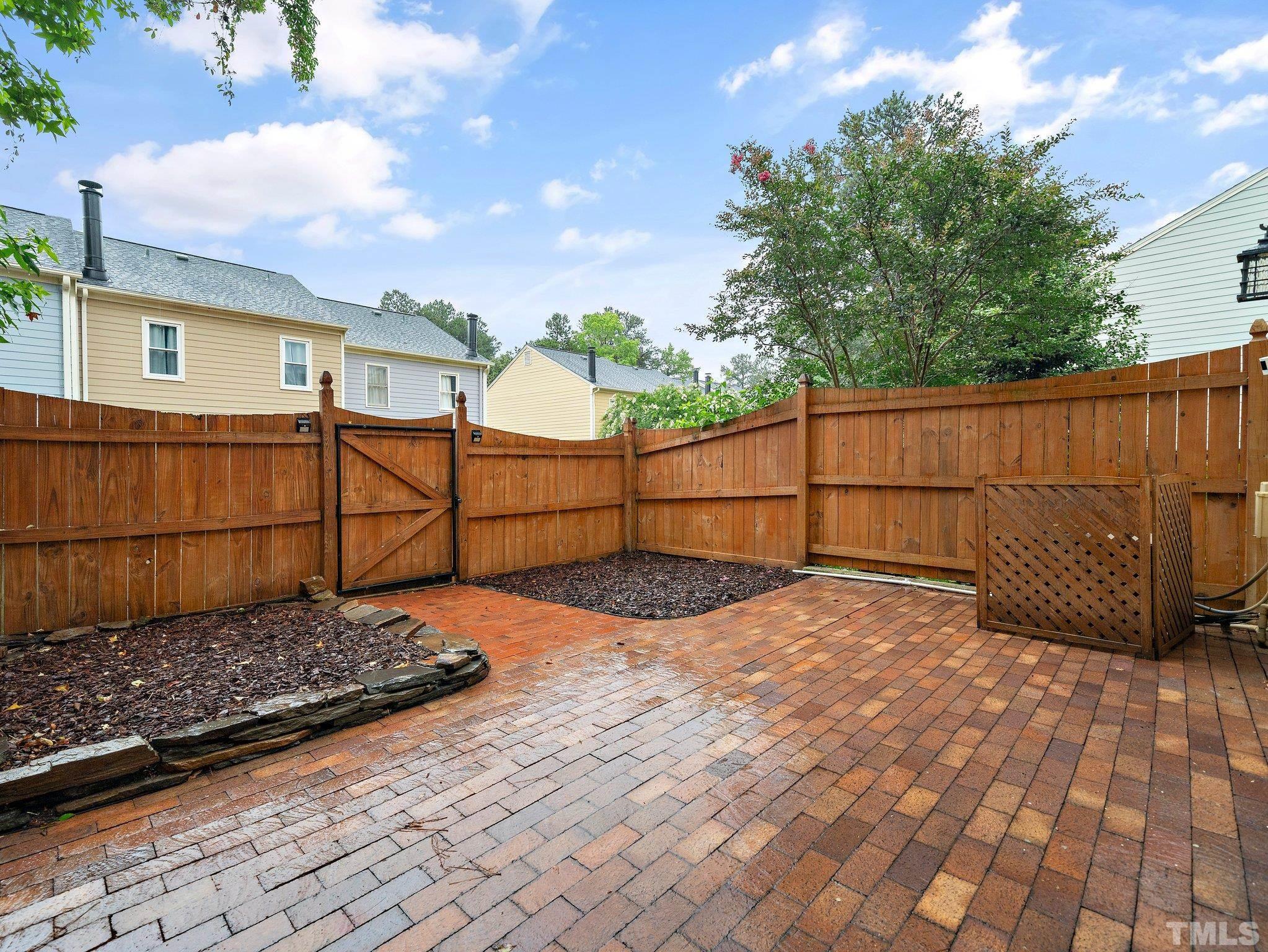 5632 Bridgetowne Way Raleigh, NC 27609 - Photo 19 of 26 a view of a backyard