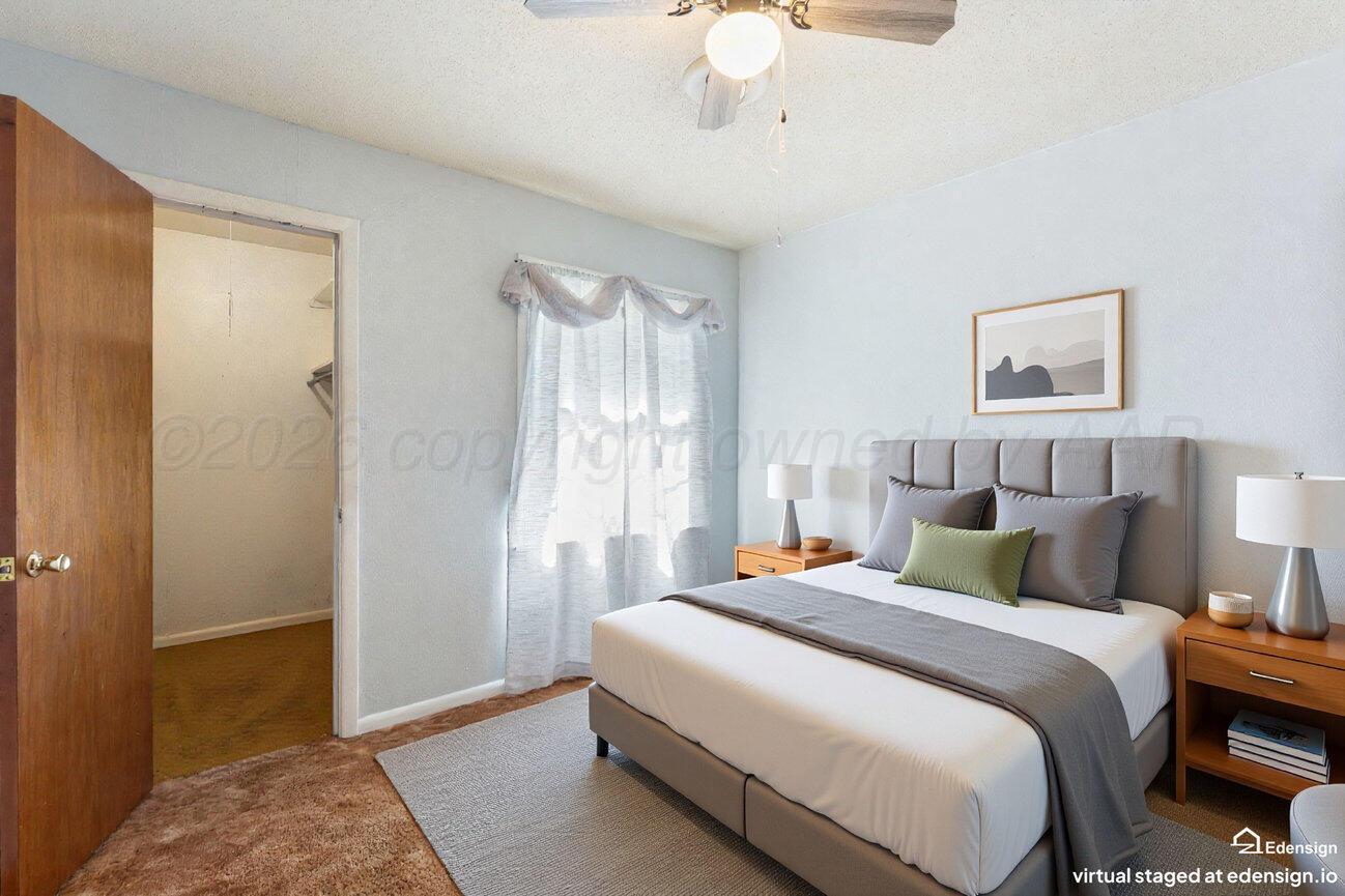 4305 South Bonham Street Amarillo, TX 79110 - Photo 33 of 48 a bedroom with bed and window