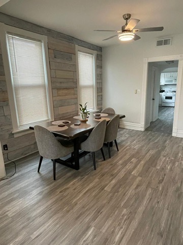3625 West Shakespeare Avenue, Unit 3 Chicago, IL 60647 - Photo 19 of 21 a dining room with furniture and window
