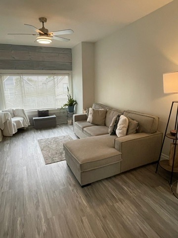 3625 West Shakespeare Avenue, Unit 3 Chicago, IL 60647 - Photo 21 of 21 a living room with furniture and a large window