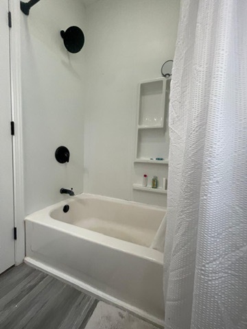 3625 West Shakespeare Avenue, Unit 3 Chicago, IL 60647 - Photo 7 of 21 a bathroom with a tub