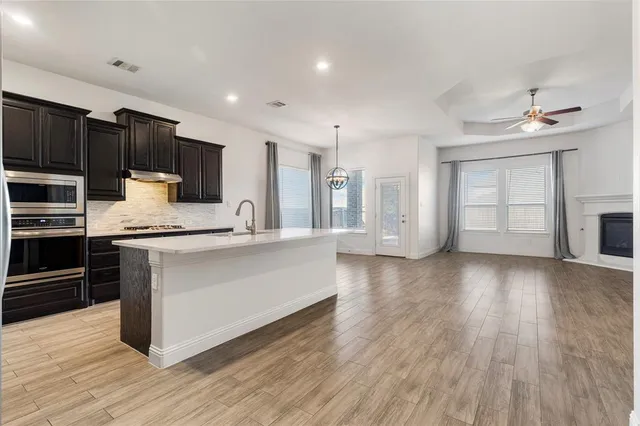 a view of a garden with a houses