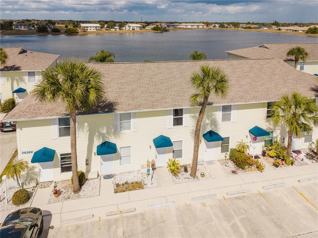 26282 Rampart Boulevard, Unit 204 Punta Gorda, FL 33983 - Photo 4 of 34 an ocean view with seating space and lake view