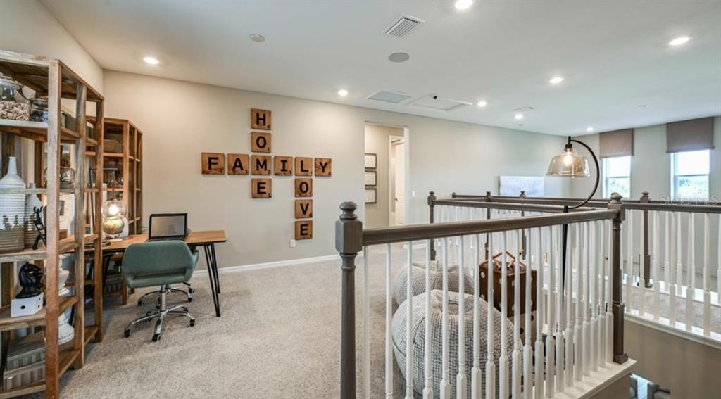 5241 Bowspirit Way St. Cloud, FL 34771 - Photo 11 of 17 a view of a hallway with workspace