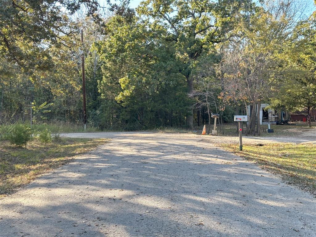 134 Thrush Road Mabank, TX 75156 - Photo 6 of 17 a view of pool with trees