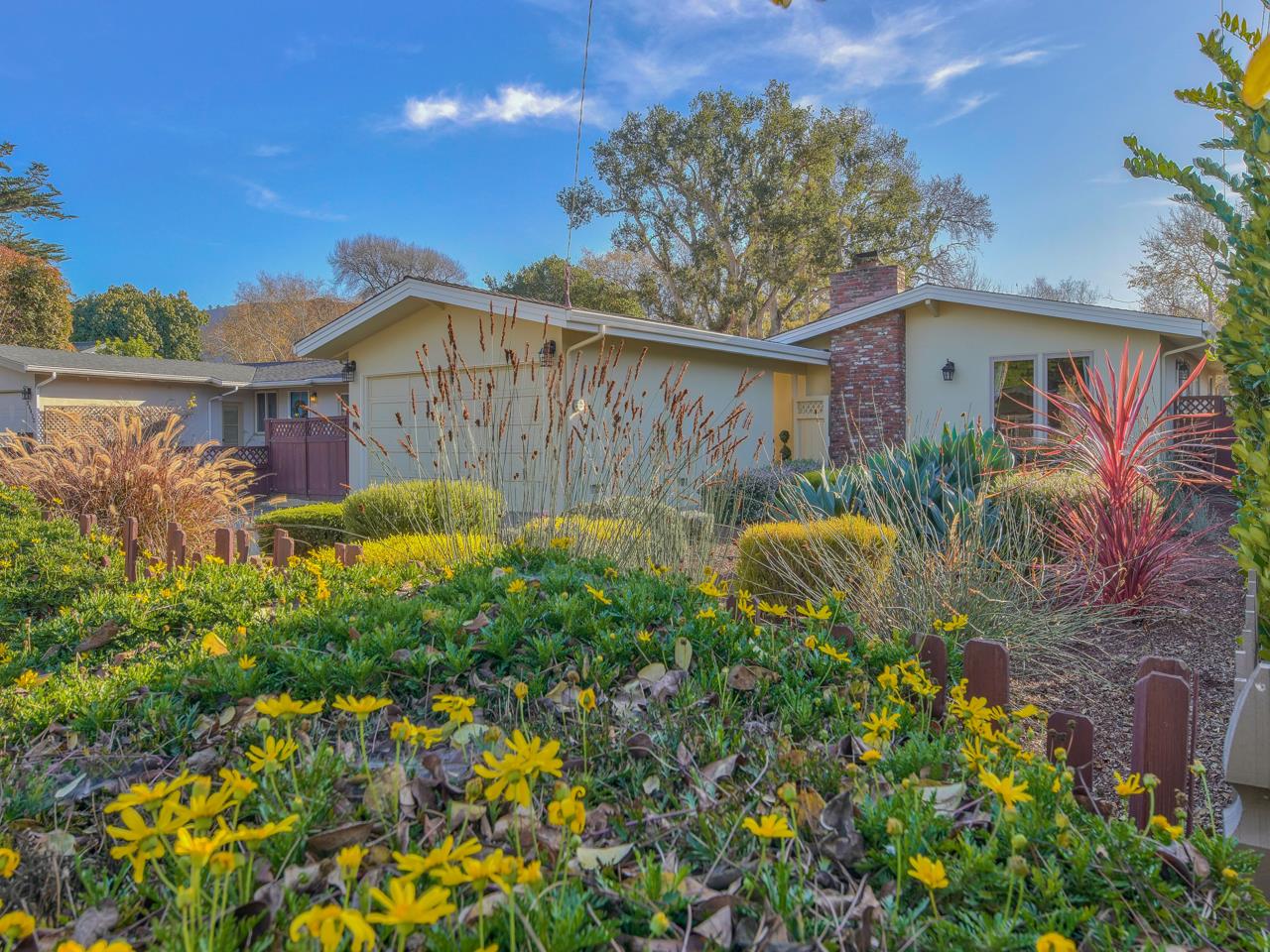 26464 Mission Fields Road Carmel, CA 93923 - Photo 2 of 35 a view of a house with a flower garden