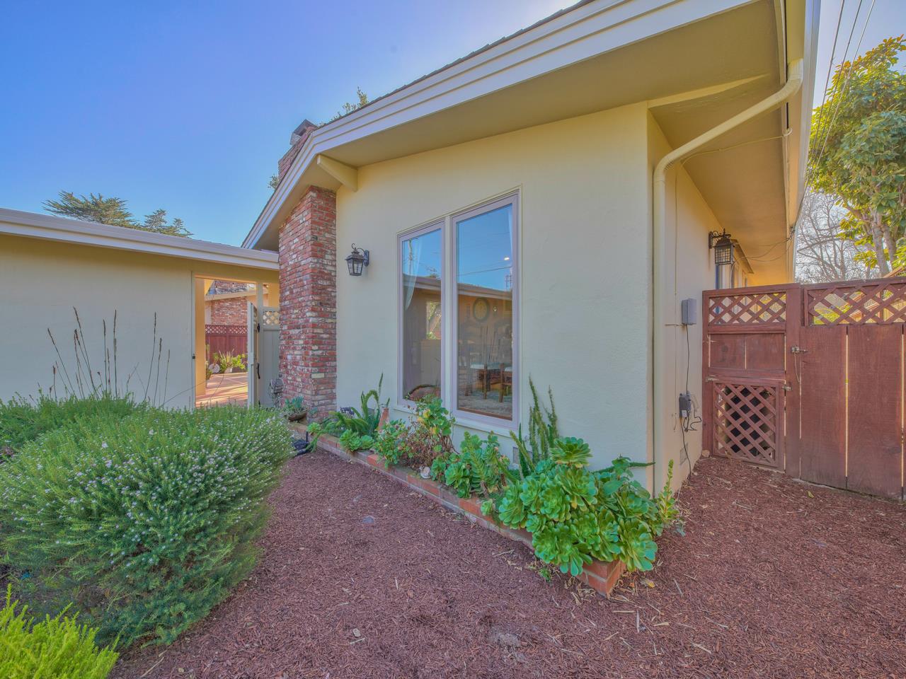 26464 Mission Fields Road Carmel, CA 93923 - Photo 4 of 35 a front view of a house with garden