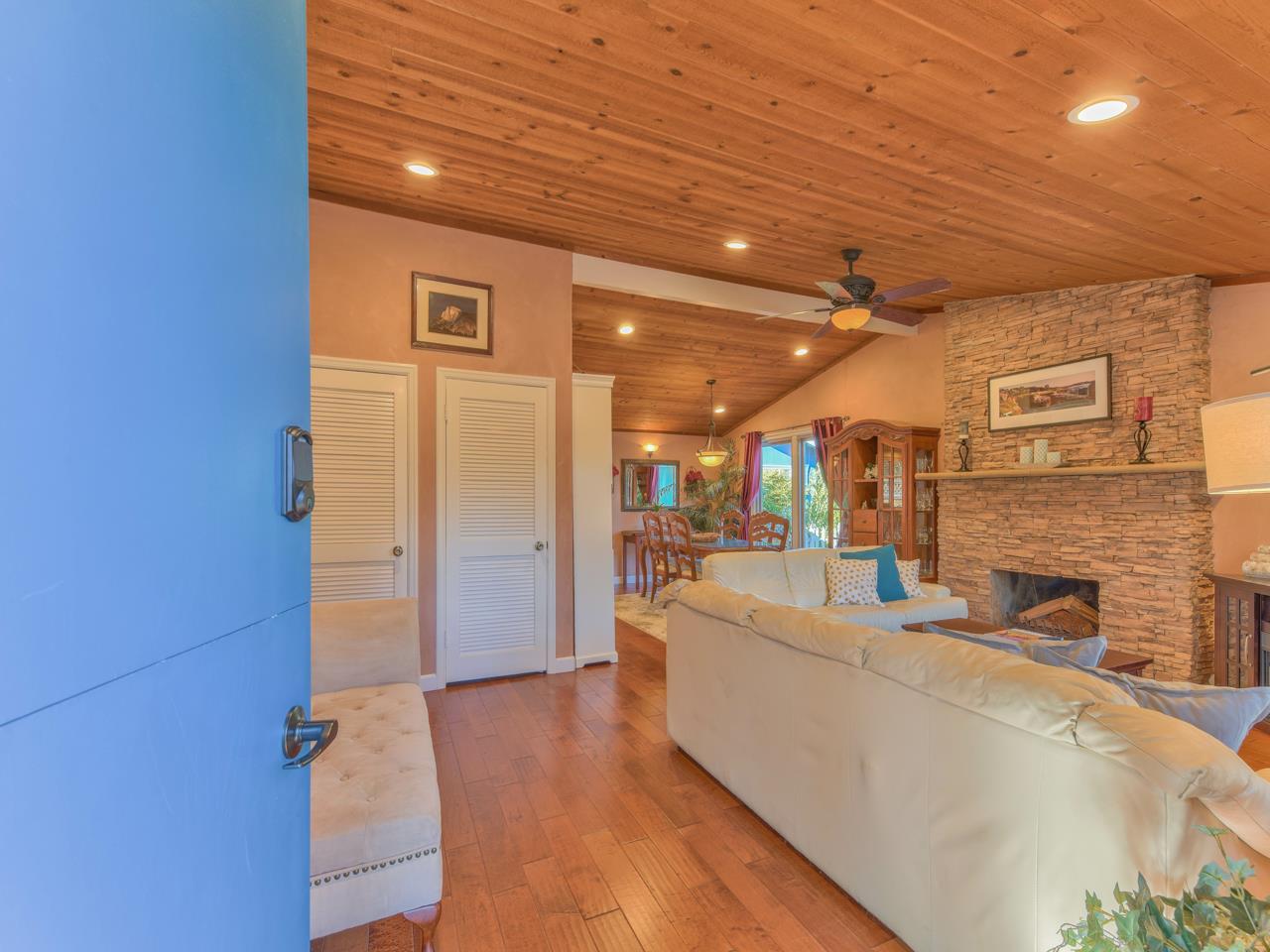 26464 Mission Fields Road Carmel, CA 93923 - Photo 10 of 35 a living room with furniture and a fireplace