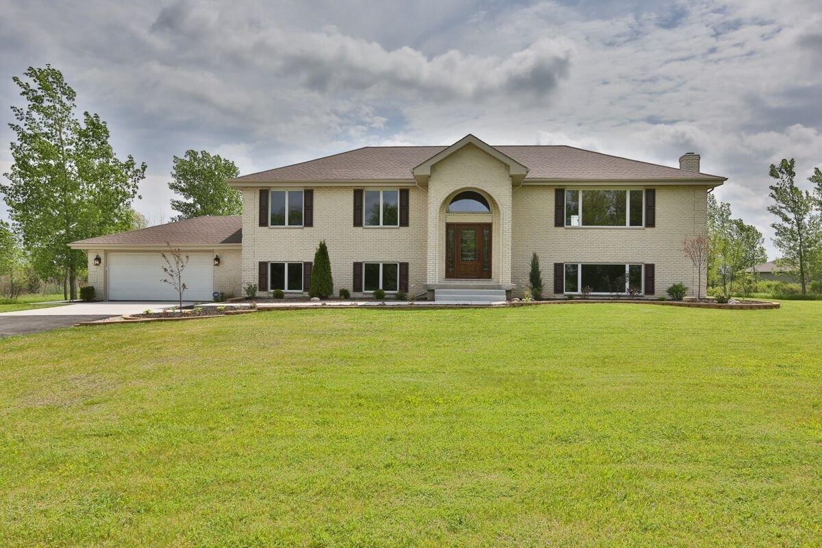12665 Stateline Road Cedar Lake, IN 46303 - Photo 1 of 10 a front view of a house with swimming pool