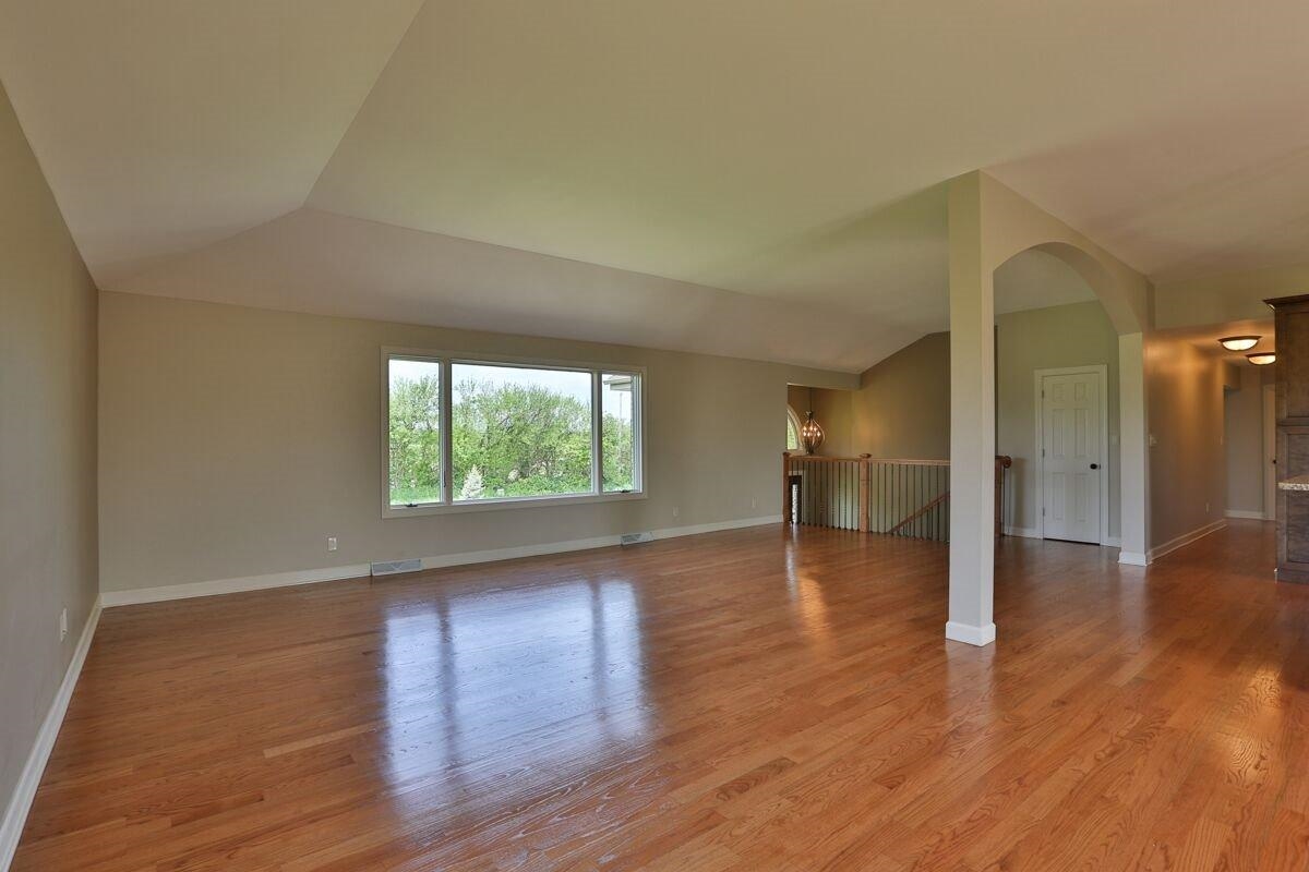 12665 Stateline Road Cedar Lake, IN 46303 - Photo 6 of 10 a view of empty room with wooden floor and fan