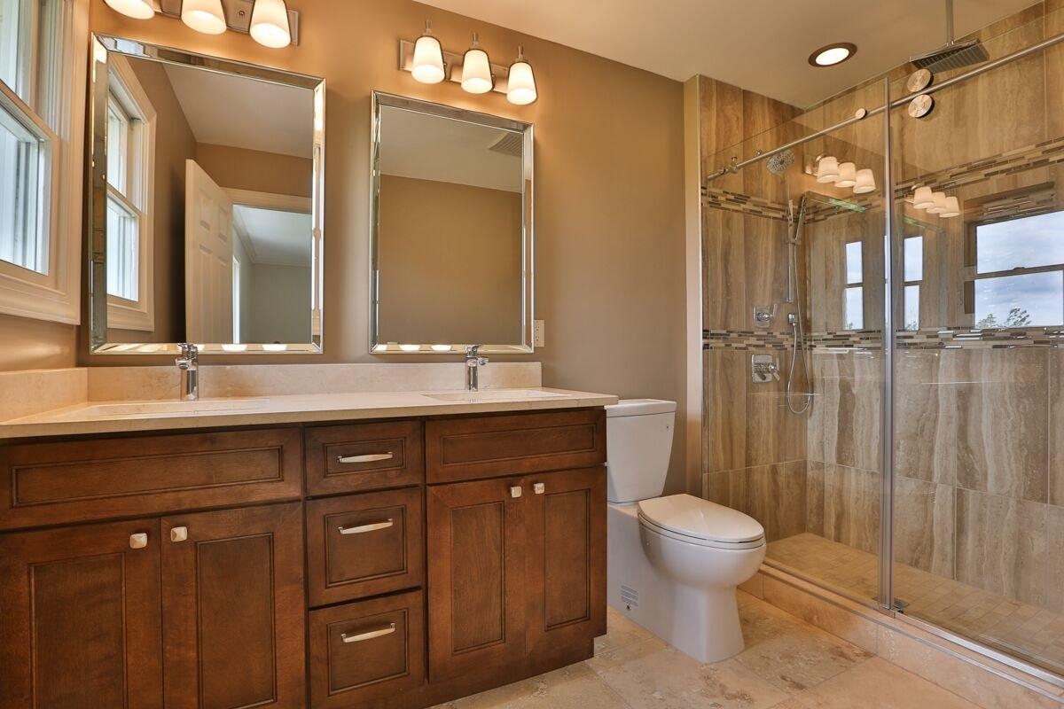 12665 Stateline Road Cedar Lake, IN 46303 - Photo 9 of 10 a bathroom with a double vanity sink toilet and shower