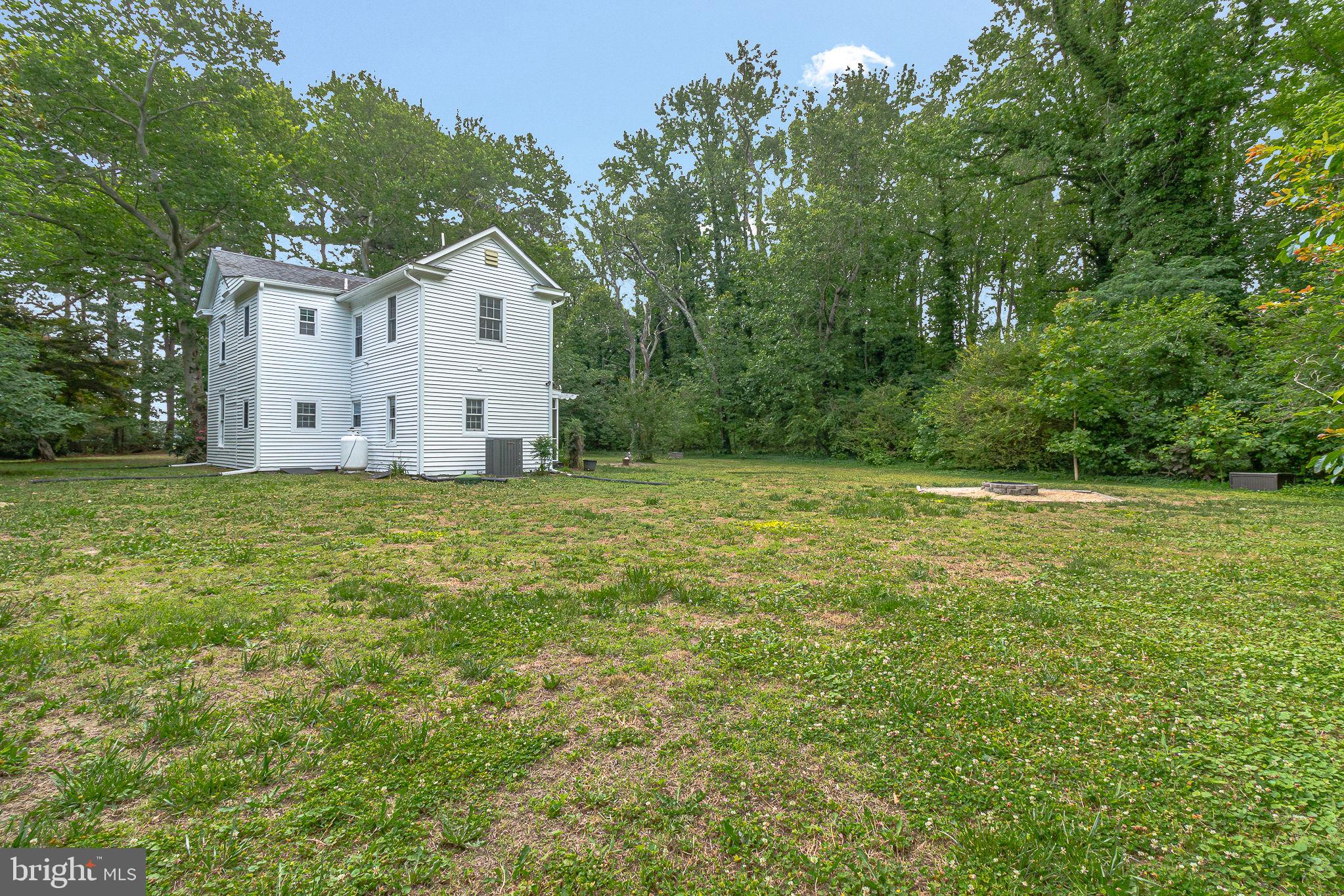 3952 Irvington Road Irvington, VA 22480 - Photo 70 of 77 a house with a tree in front of it