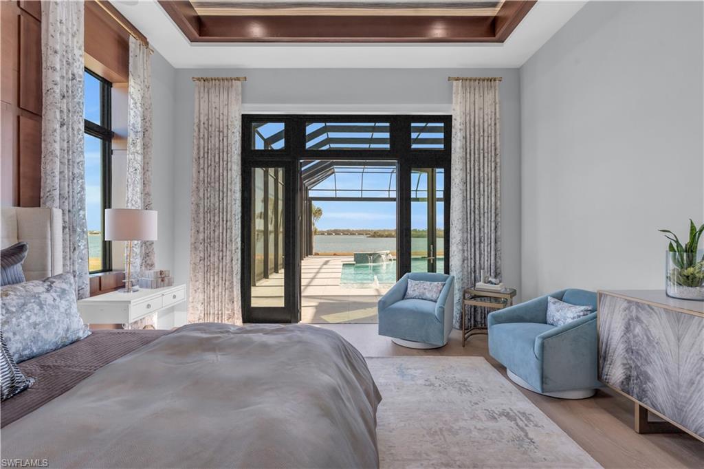 18300 Blue Eye Loop Fort Myers, FL 33913 - Photo 22 of 49 a spacious bedroom with a bed and a couch