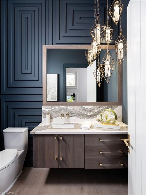 18300 Blue Eye Loop Fort Myers, FL 33913 - Photo 32 of 49 a bathroom with a sink and a mirror