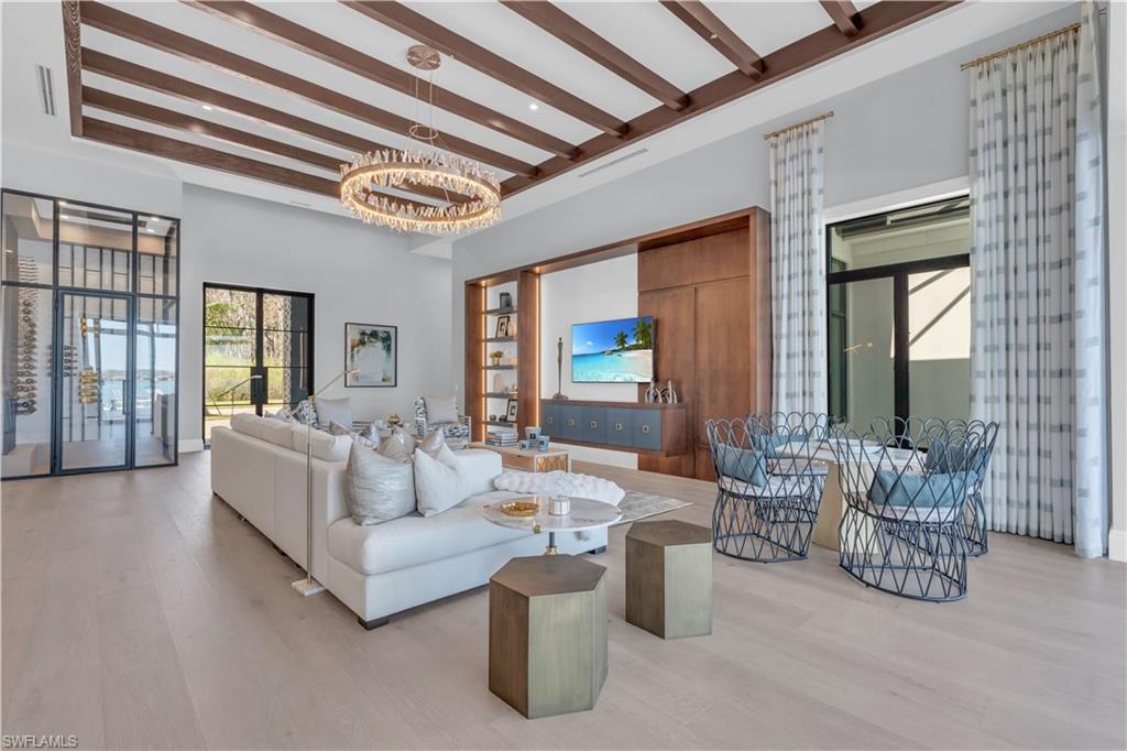 18300 Blue Eye Loop Fort Myers, FL 33913 - Photo 4 of 49 a living room with furniture and a large window