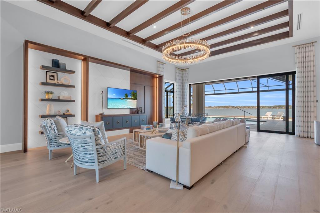 18300 Blue Eye Loop Fort Myers, FL 33913 - Photo 5 of 49 a living room with furniture and a large window