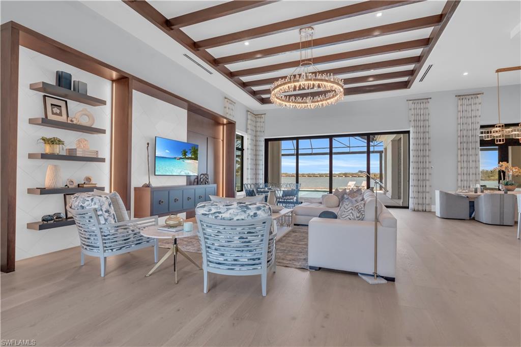 18300 Blue Eye Loop Fort Myers, FL 33913 - Photo 7 of 49 a living room with furniture and a large window