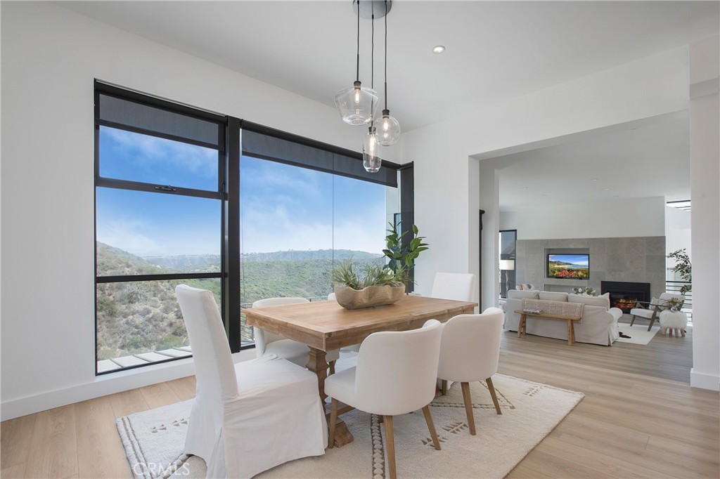 773 Barracuda Way Laguna Beach, CA 92651 - Photo 2 of 38 a living room with furniture and a chandelier