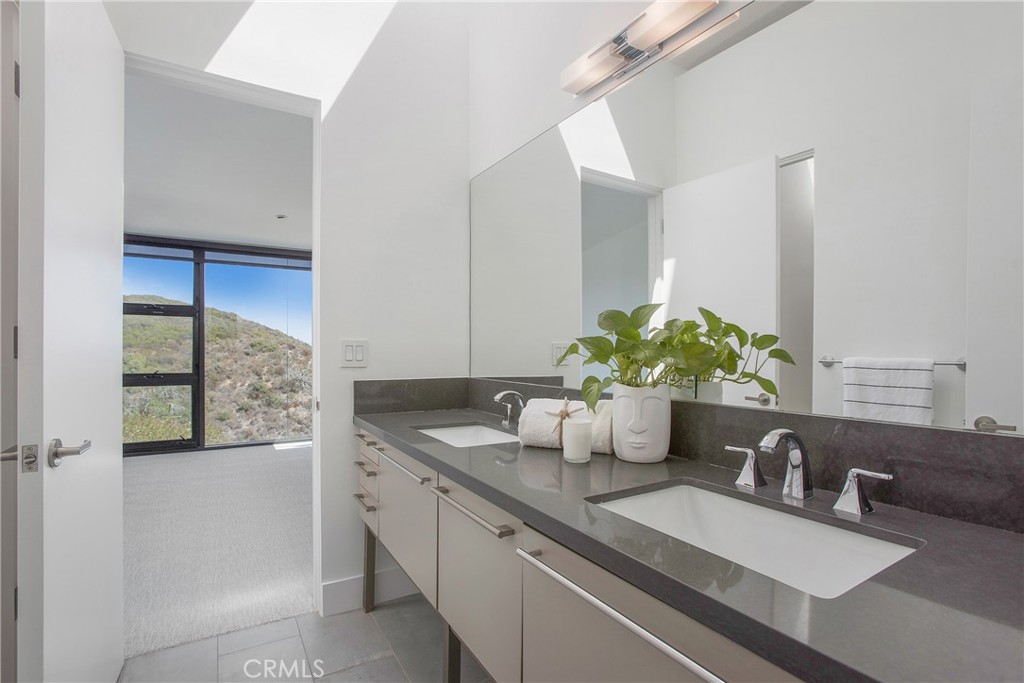 773 Barracuda Way Laguna Beach, CA 92651 - Photo 23 of 38 a close view of sink and mirror