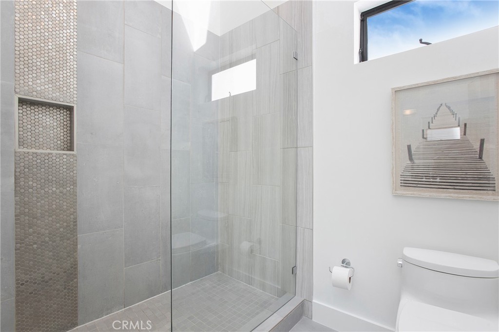 773 Barracuda Way Laguna Beach, CA 92651 - Photo 24 of 38 a bathroom with a shower and toilet