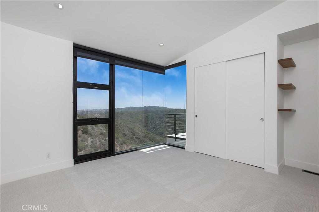 773 Barracuda Way Laguna Beach, CA 92651 - Photo 26 of 38 a view of an empty room with a window