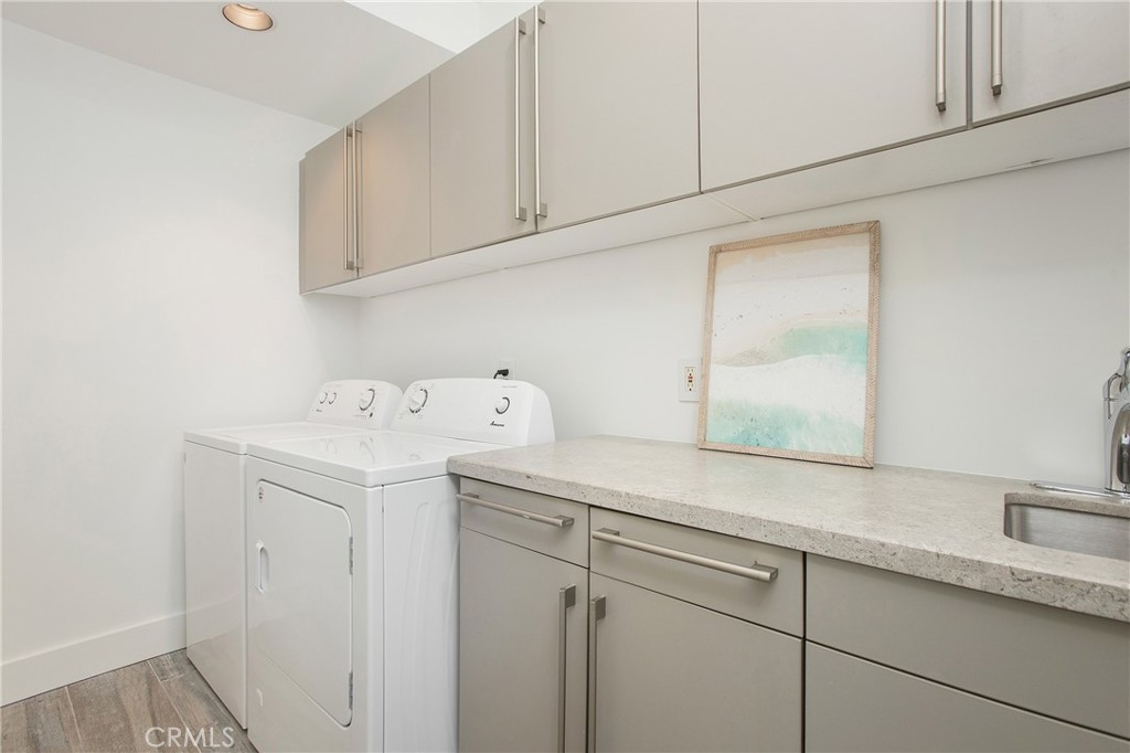 773 Barracuda Way Laguna Beach, CA 92651 - Photo 27 of 38 a utility room with a sink