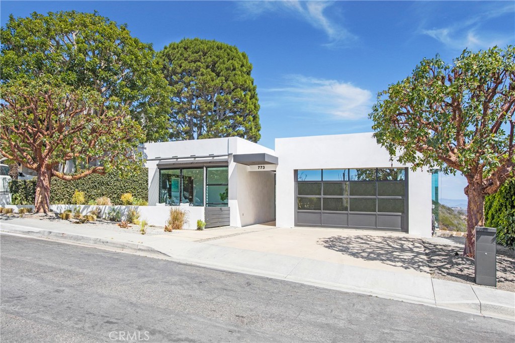 773 Barracuda Way Laguna Beach, CA 92651 - Photo 4 of 38 a view of a house with a outdoor space and porch