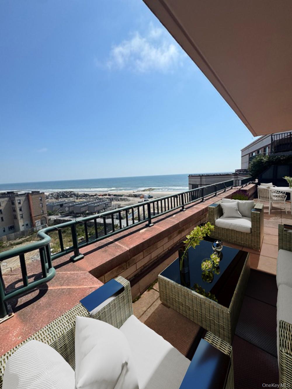 116-12 Ocean Promenade, Unit 706 Queens, NY 11694 - Photo 1 of 10 a balcony with wooden floor and outdoor seating