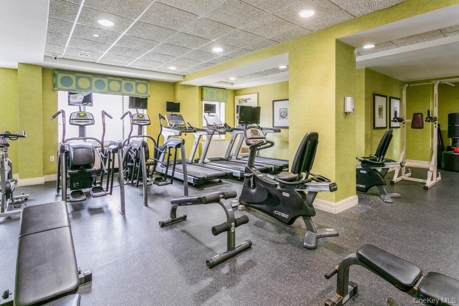 116-12 Ocean Promenade, Unit 706 Queens, NY 11694 - Photo 6 of 10 a view of a room with gym equipment