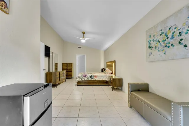 a living room with furniture and a couch