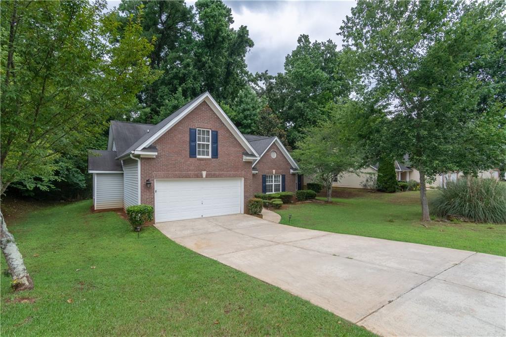 3829 Leprechaun Court Decatur, GA 30034 - Photo 1 of 1 a front view of a house with a yard and trees