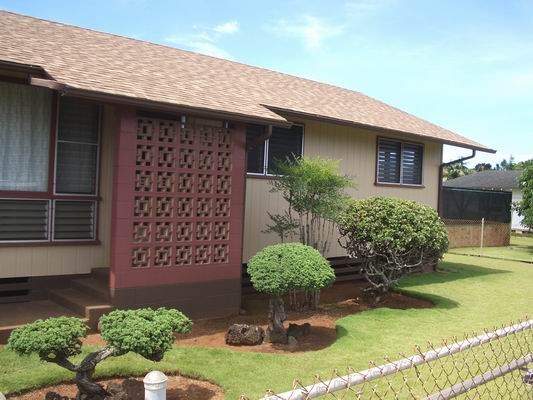 5200 Sokei Road Kapaa, HI 96746 - Photo 1 of 22 a house view with a garden space