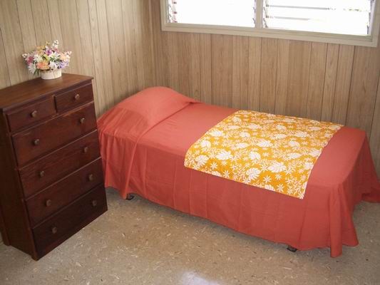 5200 Sokei Road Kapaa, HI 96746 - Photo 9 of 22 a bedroom with a bed and a dresser