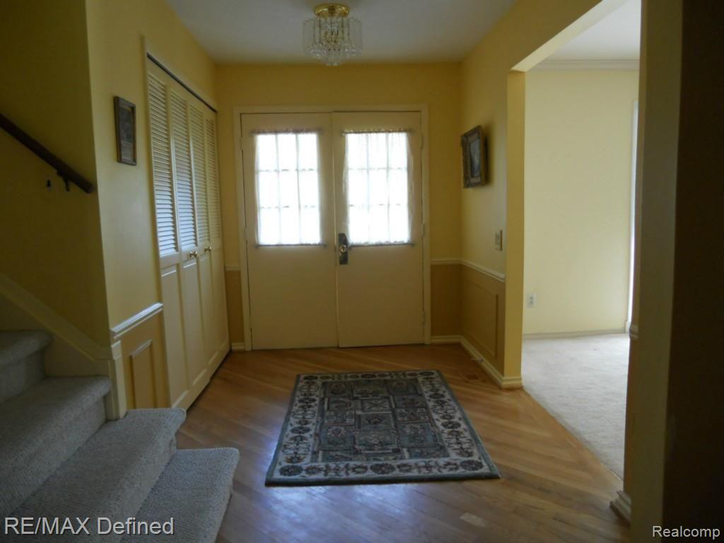 Entryway with custom wood floor