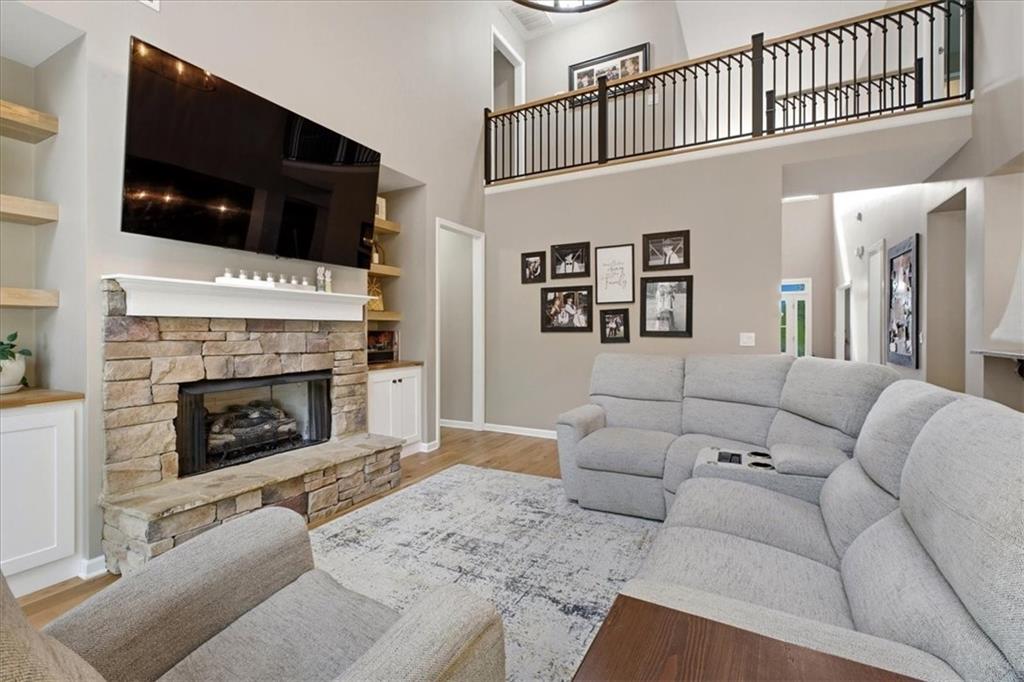 19 Pinoak Trail Cartersville, GA 30121 - Photo 18 of 55 a living room with furniture fireplace and flat screen tv