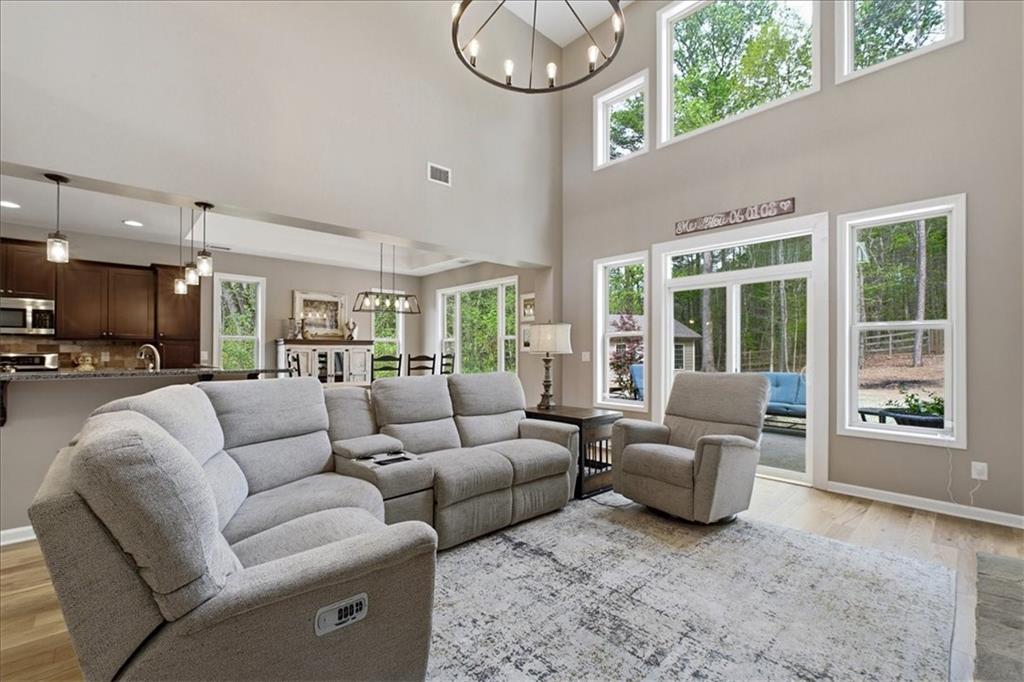 19 Pinoak Trail Cartersville, GA 30121 - Photo 20 of 55 a living room with furniture and a large window