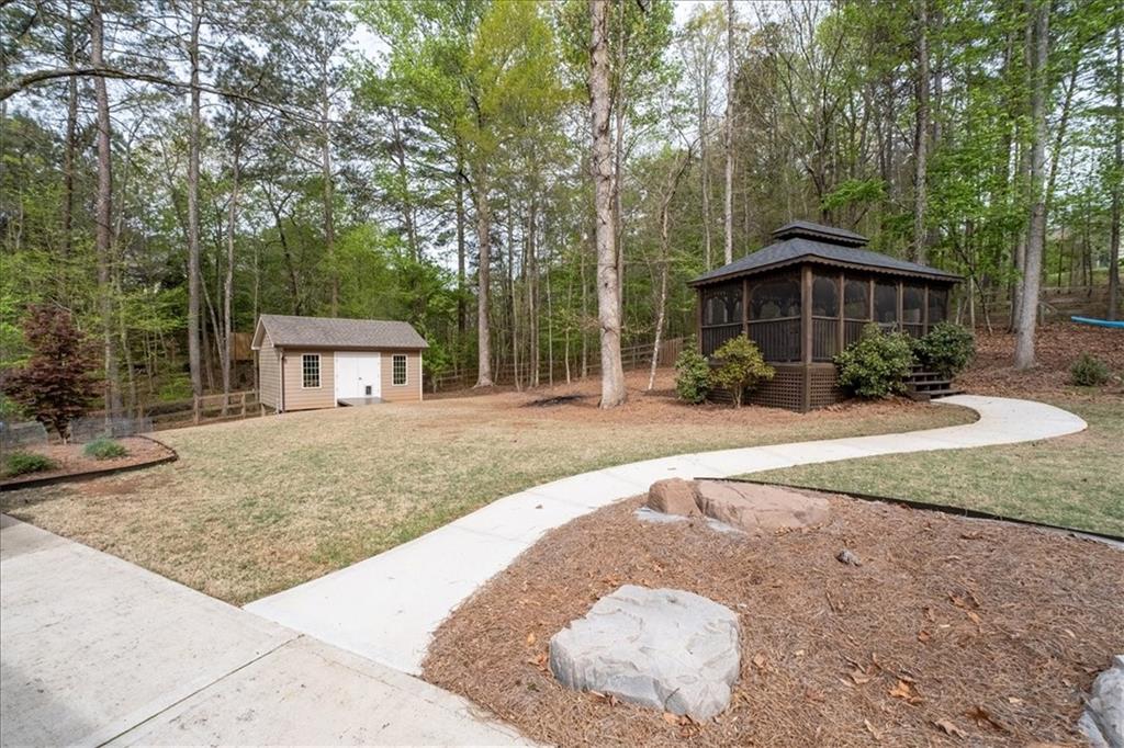 19 Pinoak Trail Cartersville, GA 30121 - Photo 37 of 55 a view of a house with a yard