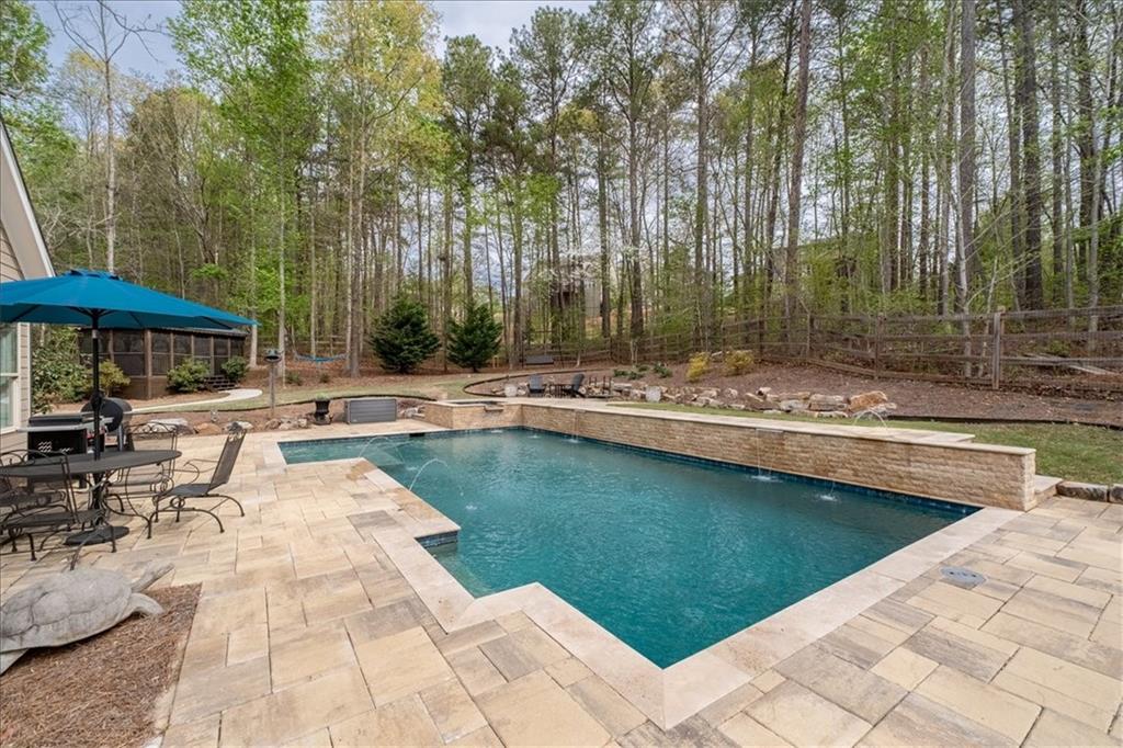 19 Pinoak Trail Cartersville, GA 30121 - Photo 38 of 55 a outdoor space with swimming pool and furniture