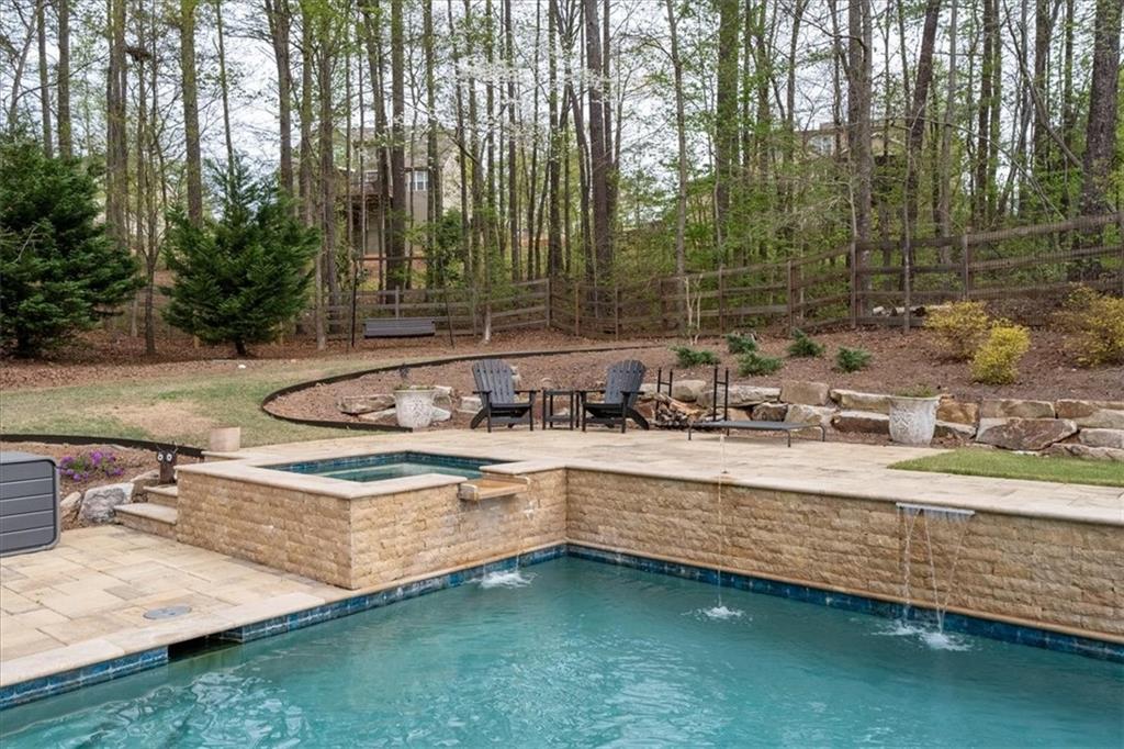 19 Pinoak Trail Cartersville, GA 30121 - Photo 40 of 55 a view of backyard with swimming pool and outdoor seating