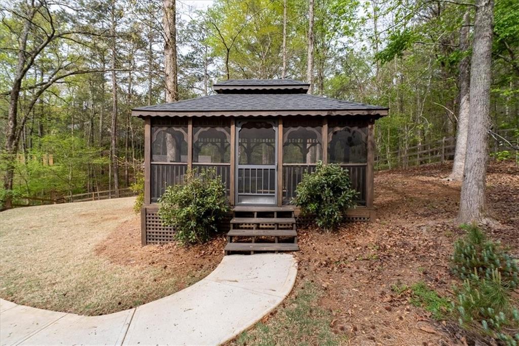 19 Pinoak Trail Cartersville, GA 30121 - Photo 44 of 55 a front view of a house with garden