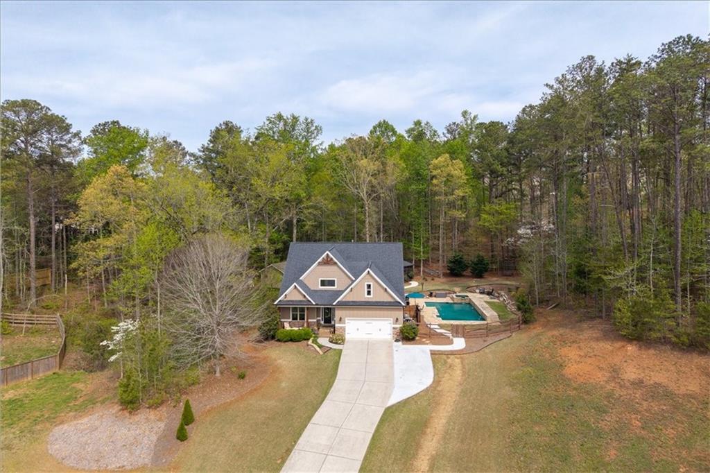 19 Pinoak Trail Cartersville, GA 30121 - Photo 48 of 55 a view of a swimming pool with a patio