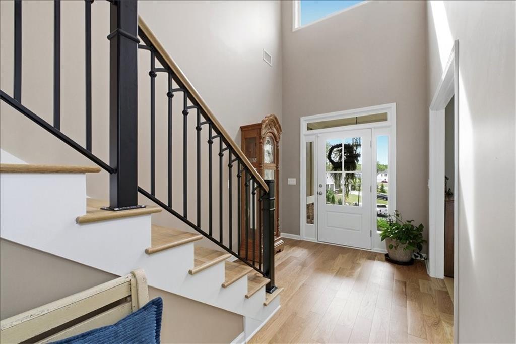 19 Pinoak Trail Cartersville, GA 30121 - Photo 6 of 55 a view of an entryway with wooden floor and stairs