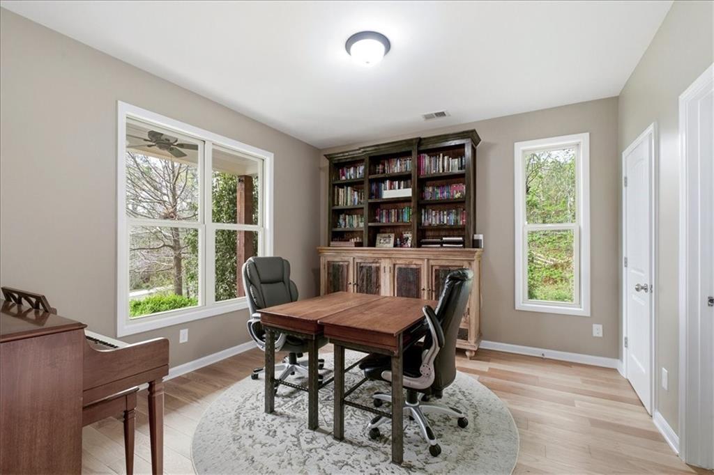 19 Pinoak Trail Cartersville, GA 30121 - Photo 7 of 55 a view of a workspace with furniture and a window