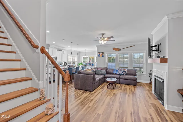 a view of entryway with stairs and wooden floor
