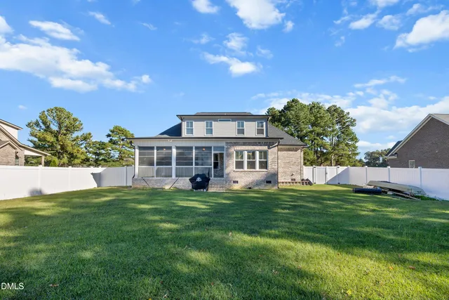 a view of bedroom with a bed and hardwood