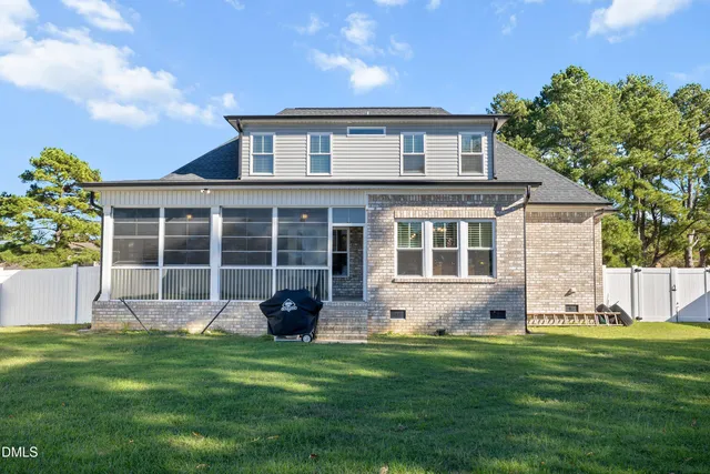 a view of a house with a big yard