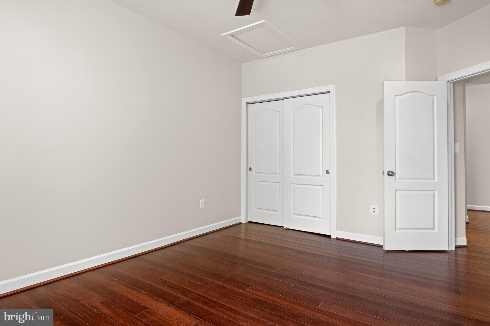 16862 Reef Knot Way Woodbridge, VA 22191 - Photo 58 of 99 a view of an empty room with wooden floor