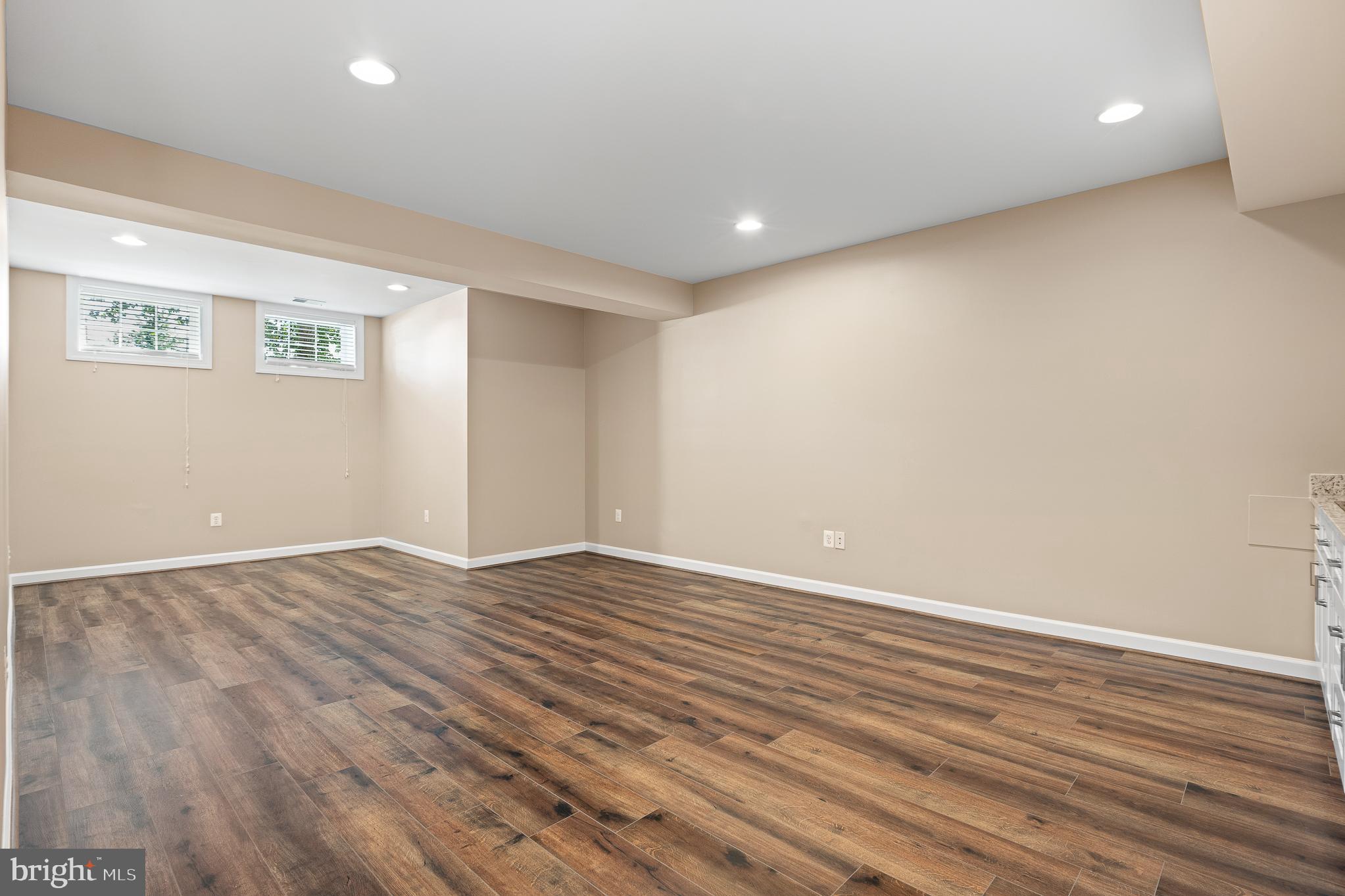16862 Reef Knot Way Woodbridge, VA 22191 - Photo 67 of 99 a view of an empty room with wooden floor and a window