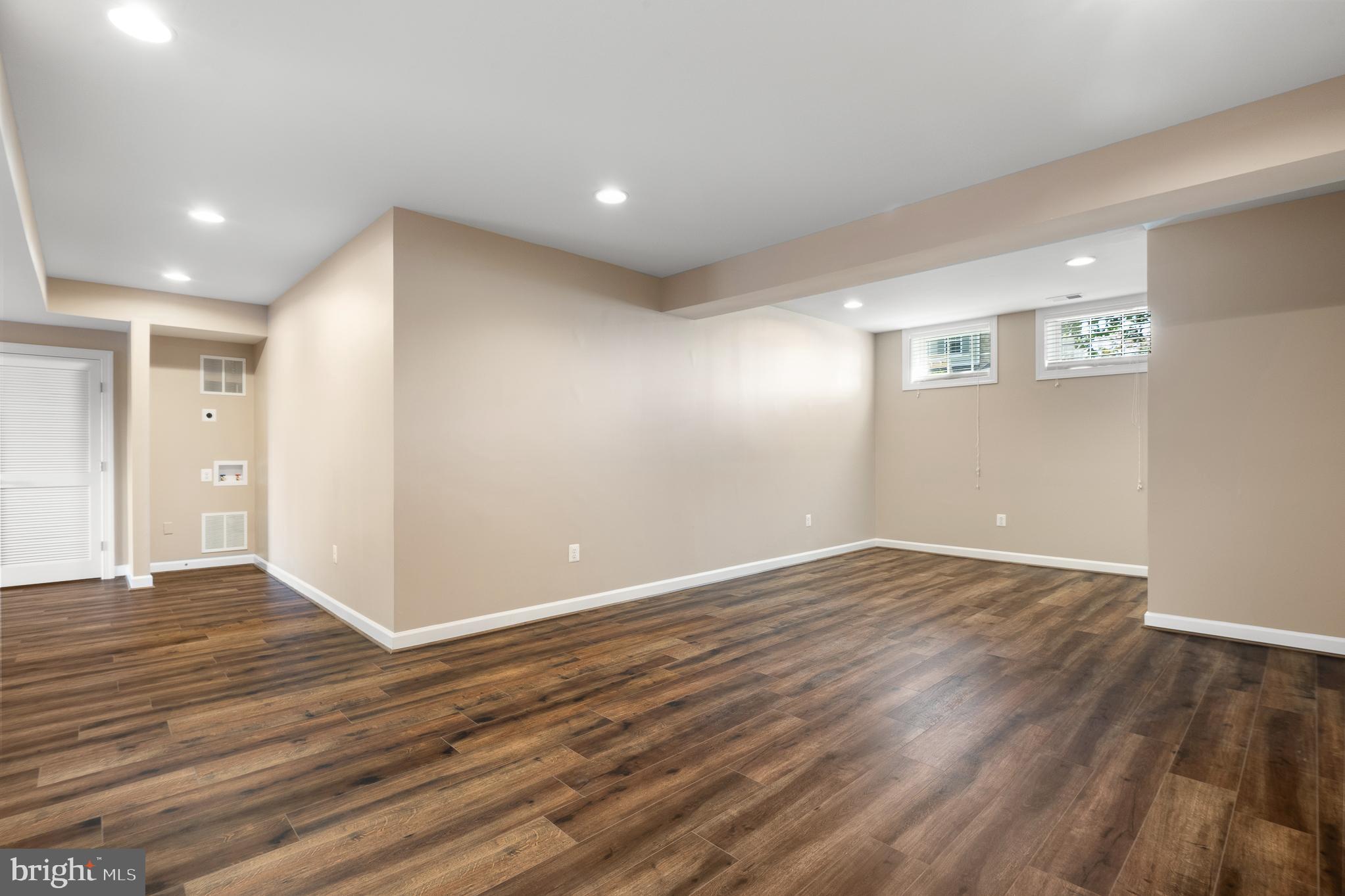 16862 Reef Knot Way Woodbridge, VA 22191 - Photo 73 of 99 a view of an empty room with wooden floor
